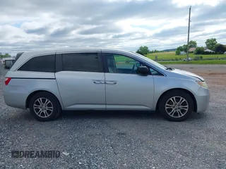 2012 Honda Odyssey EX-L with VIN 5FNRL5H63CB063815, listed as a IAAI auction lot 42302937 with 377,768 mi miles and . Bid and sale history available at DreamBid. Image 13.