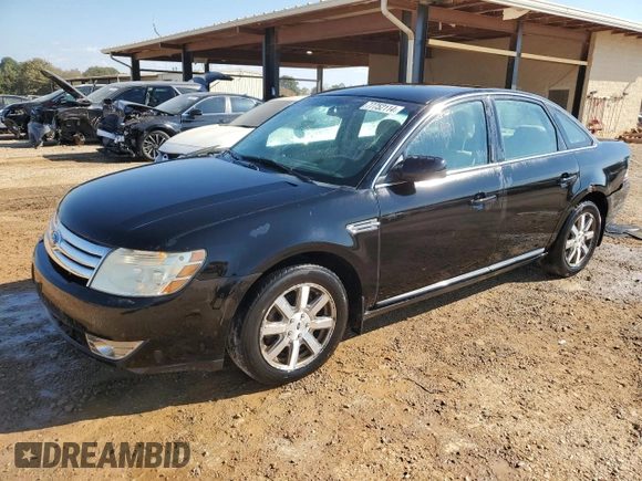 2008 Ford Taurus SEL with VIN 1FAHP24W68G164015, listed as a Copart auction lot 77752114 with 197,691 mi miles and Salvage Title. Bid and sale history available at carsss.com. Image 1.