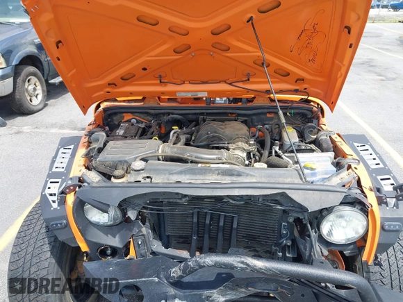 2013 Jeep Wrangler Sport z VIN 1C4AJWAG2DL538526, wystawiony jako IAAI lot #42378501 z przebiegiem 81 709 mil mil oraz . Historia ofert i sprzedaży dostępna na DreamBid. Obrazek 10.