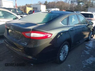 2015 Ford Fusion SE Hybrid with VIN 3FA6P0LUXFR165766, listed as a IAAI auction lot 41409353 with 32,388 mi miles. Bid and sale history available at carsss.com. Image 4.