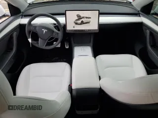 2024 Tesla Model Y Long Range with VIN 7SAYGDEE2RA329081, listed as a Copart auction lot 57254265 with 2,325 mi miles and Salvage title. Bid and sale history available at DreamBid. Image 8.