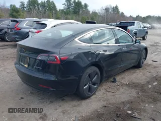 2018 Tesla Model 3 Long Range Battery z VIN 5YJ3E1EB3JF127410, wystawiony jako IAAI lot #41994858 z przebiegiem 100 494 mil mil oraz . Historia ofert i sprzedaży dostępna na DreamBid. Obrazek 4.