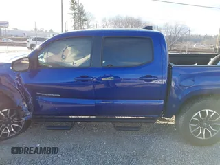 2023 Toyota Tacoma 4WD SR with VIN 3TYCZ5AN1PT119133, listed as a IAAI auction lot 41574906 with 19,887 mi miles. Bid and sale history available at carsss.com. Image 13.