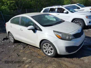 2013 Kia Rio LX with VIN KNADM4A32D6284804, listed as a IAAI auction lot 41935043 with 224,279 mi miles. Bid and sale history available at carsss.com. Image 1.
