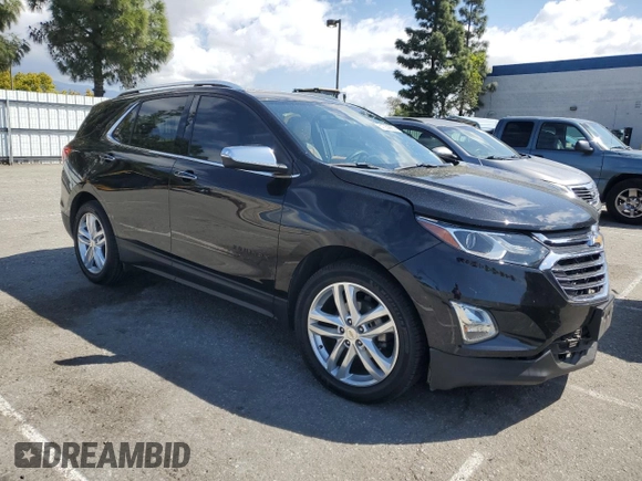 2018 Chevrolet Equinox Premier with VIN 2GNAXMEV7J6157052, listed as a Copart auction lot 51359965 with 145,382 mi miles and Salvage Title. Bid and sale history available at carsss.com. Image 4.