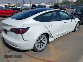 2023 Tesla Model 3 with VIN 5YJ3E1EA9PF640015, listed as a IAAI auction lot 41622086 with 15,622 mi miles and . Bid and sale history available at carsss.com. Image 4.