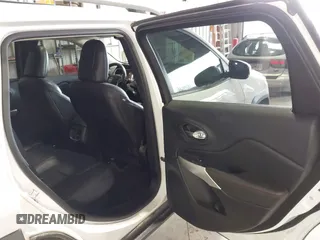 2017 Jeep Cherokee Trailhawk with VIN 1C4PJMBS5HW614956, listed as a IAAI auction lot 42079991 with 143,378 mi miles and . Bid and sale history available at DreamBid. Image 8.