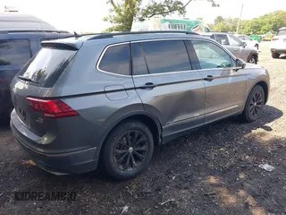 2018 Volkswagen Tiguan SEL with VIN 3VV2B7AXXJM020392, listed as a IAAI auction lot 42646948 with 58,685 mi miles and . Bid and sale history available at DreamBid. Image 4.