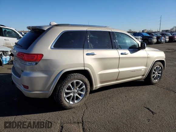 2015 Jeep Grand Cherokee High Altitude with VIN 1C4RJFCM6FC878769, listed as a Copart auction lot 46704755 with 81,727 mi miles and Salvage title. Bid and sale history available at DreamBid. Image 3.