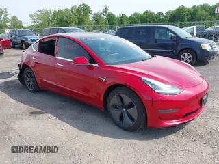 2018 Tesla Model 3 Long Range Battery z VIN 5YJ3E1EB4JF085068, wystawiony jako IAAI lot #42395812 z przebiegiem 57 817 mil mil oraz . Historia ofert i sprzedaży dostępna na DreamBid. Obrazek 1.