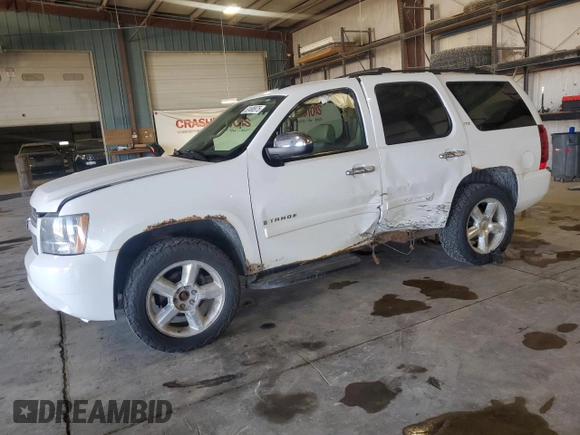 2007 Chevrolet Tahoe LTZ with VIN 1GNFK13007J313566, listed as a Copart auction lot 52498975 with 234,744 mi miles and Salvage title. Bid and sale history available at DreamBid. Image 1.