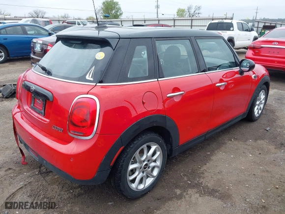 2019 MINI Hardtop 4 Door Cooper with VIN WMWXU1C58K2J02294, listed as a IAAI auction lot 41910654 with 97,887 mi miles. Bid and sale history available at carsss.com. Image 4.