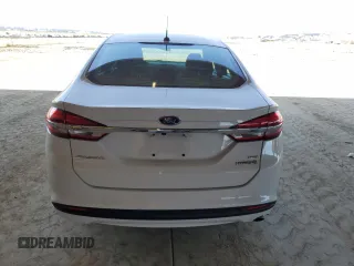 2018 Ford Fusion SE z VIN 3FA6P0LU4JR139169, wystawiony jako Copart lot #60086205 z przebiegiem 226 691 mil mil oraz Szkoda całkowita • Salvage title. Historia ofert i sprzedaży dostępna na DreamBid. Obrazek 6.