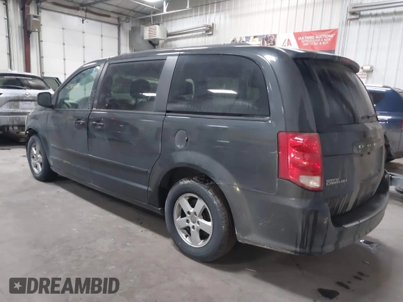 2012 Dodge Grand Caravan SXT with VIN 2C4RDGCG7CR358266, listed as a IAAI auction lot 41582428 with 169,137 mi miles and . Bid and sale history available at DreamBid. Image 3.