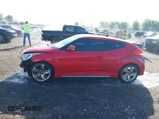 2013 Hyundai Veloster Turbo z VIN KMHTC6AE3DU169229, wystawiony jako IAAI lot #42087798 z przebiegiem 120 741 mil mil oraz . Historia ofert i sprzedaży dostępna na DreamBid. Obrazek 14.