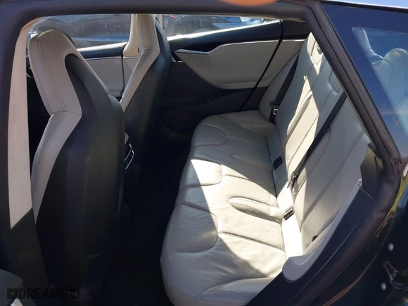 2013 Tesla Model S with VIN 5YJSA1CN7DFP26335, listed as a IAAI auction lot 41529752 with 247,789 mi miles. Bid and sale history available at carsss.com. Image 8.