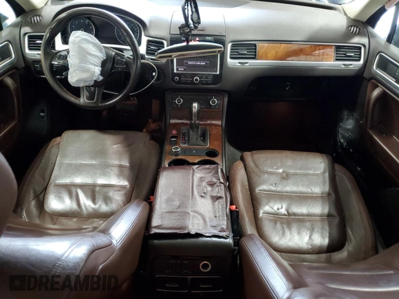 2014 Volkswagen Touareg Sport with VIN WVGEF9BP2ED002718, listed as a Copart auction lot 59526575 with 194,480 mi miles and Non repairable. Bid and sale history available at DreamBid. Image 8.