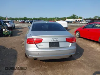 2013 Audi A8 3.0L с VIN WAURGAFD7DN016351, выставлен на аукционе IAAI как лот 42372202 с пробегом 90 753 миль миль и . История ставок и продаж доступна на DreamBid. Изображение 16.