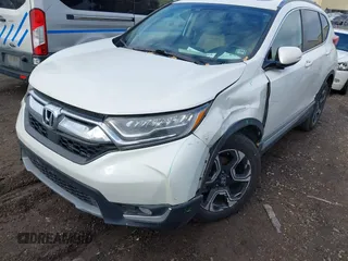 2017 Honda CR-V Touring with VIN 5J6RW2H92HL040217, listed as a IAAI auction lot 41044193 with 180,842 mi miles. Bid and sale history available at carsss.com. Image 17.
