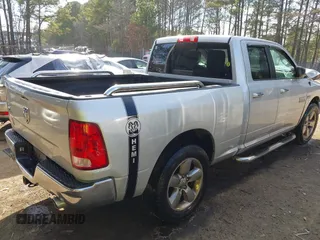 2015 Ram 1500 Big Horn with VIN 1C6RR6GT8FS569506, listed as a IAAI auction lot 41668921 with 214,708 mi miles. Bid and sale history available at carsss.com. Image 4.
