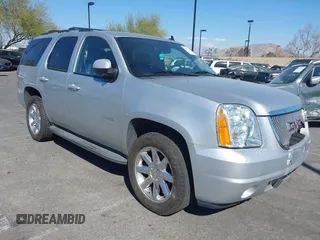2013 GMC Yukon SLT with VIN 1GKS1CE07DR157076, listed as a IAAI auction lot 41557228 with 148,242 mi miles. Bid and sale history available at carsss.com. Image 1.