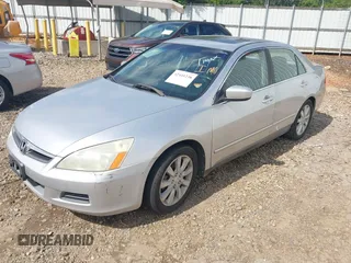 2006 Honda Accord LX with VIN 1HGCM66366A039749, listed as a IAAI auction lot 42441238 with 306,786 mi miles and . Bid and sale history available at DreamBid. Image 2.