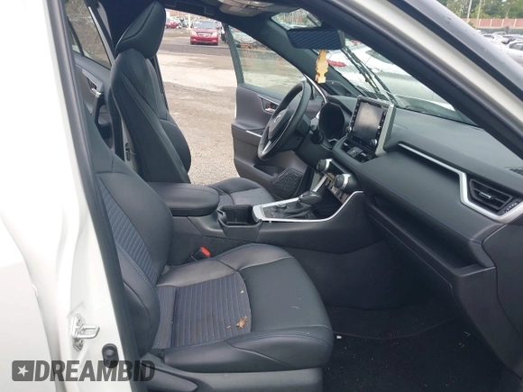 2022 Toyota RAV4 Hybrid XSE with VIN 4T3E6RFV6NU084601, listed as a IAAI auction lot 42377887 with 81,084 mi miles and . Bid and sale history available at DreamBid. Image 5.