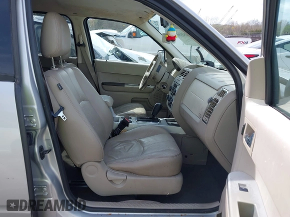 2008 Mercury Mariner with VIN 4M2CU29H38KJ29379, listed as a IAAI auction lot 41933568 with Not provided miles and . Bid and sale history available at DreamBid. Image 5.