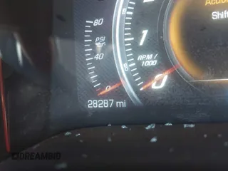 2016 Chevrolet Corvette 1LT z VIN 1G1YB2D77G5111974, wystawiony jako IAAI lot #42134341 z przebiegiem 28 287 mil mil oraz . Historia ofert i sprzedaży dostępna na DreamBid. Obrazek 16.