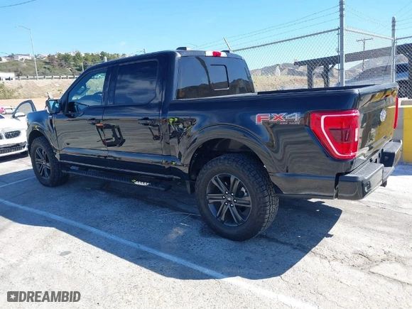 2021 Ford F-150 XL with VIN 1FTFW1E5XMFC81231, listed as a IAAI auction lot 41598484 with 29,840 mi miles. Bid and sale history available at carsss.com. Image 3.