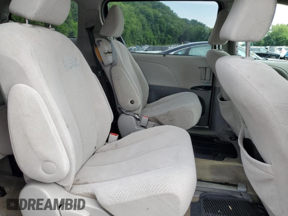 2012 Toyota Sienna LE AAS with VIN 5TDKK3DC4CS253719, listed as a Copart auction lot 63990175 with 155,561 mi miles and Salvage title. Bid and sale history available at DreamBid. Image 11.