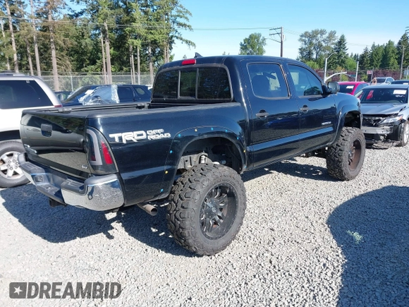 2015 Toyota Tacoma with VIN 3TMLU4EN1FM167938, listed as a IAAI auction lot 42349196 with 150,865 mi miles and . Bid and sale history available at DreamBid. Image 4.