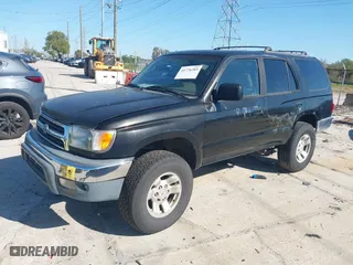 1999 Toyota 4Runner SR5 with VIN JT3HN86RXX0225002, listed as a IAAI auction lot 41776203 with 257,100 mi miles. Bid and sale history available at carsss.com. Image 2.