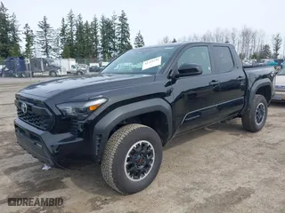 2024 Toyota Tacoma 4WD SR5 with VIN 3TYLB5JNXRT023606, listed as a IAAI auction lot 41759736 with 13,287 mi miles. Bid and sale history available at carsss.com. Image 17.