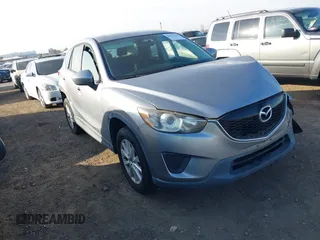 2014 Mazda CX-5 Sport with VIN JM3KE2BE9E0330345, listed as a IAAI auction lot 41377335 with 103,340 mi miles and . Bid and sale history available at carsss.com. Image 1.