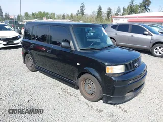 2005 Scion xB with VIN JTLKT334454021261, listed as a IAAI auction lot 42124927 with 221,043 mi miles. Bid and sale history available at carsss.com. Image 1.