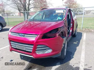 2016 Ford Escape SE with VIN 1FMCU9G99GUA89298, listed as a IAAI auction lot 42013116 with 192,408 mi miles. Bid and sale history available at carsss.com. Image 2.