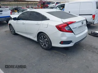 2018 Honda Civic EX with VIN 19XFC2F76JE206191, listed as a IAAI auction lot 41949231 with 146,118 mi miles and . Bid and sale history available at DreamBid. Image 3.