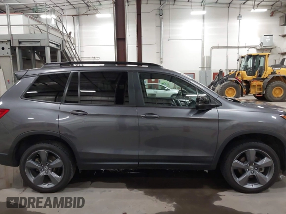 2019 Honda Passport Touring with VIN 5FNYF8H98KB007933, listed as a IAAI auction lot 41953263 with 87,614 mi miles and . Bid and sale history available at DreamBid. Image 13.