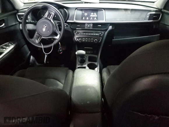 2018 Kia Optima S с VIN 5XXGT4L31JG183167, выставлен на аукционе Copart как лот 57238755 с пробегом 78 663 миль миль и Списание • Salvage title. История ставок и продаж доступна на DreamBid. Изображение 8.