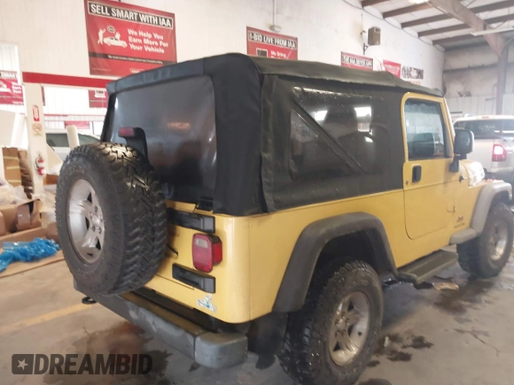 2005 Jeep Wrangler Unlimited with VIN 1J4FA44S95P373346, listed as a IAAI auction lot 41707821 with 175,865 mi miles. Bid and sale history available at carsss.com. Image 4.