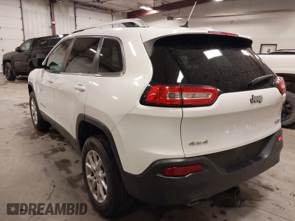 2014 Jeep Cherokee Latitude with VIN 1C4PJMCS4EW318353, listed as a IAAI auction lot 41945598 with 179,425 mi miles and . Bid and sale history available at DreamBid. Image 3.
