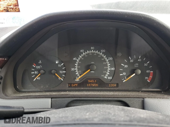 1999 Mercedes-Benz E-Class with VIN WDBJF65H3XA882627, listed as a Copart auction lot 72476674 with 187,656 mi miles and Salvage Title. Bid and sale history available at carsss.com. Image 9.