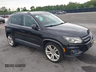 2012 Volkswagen Tiguan S with VIN WVGBV7AX6CW592242, listed as a IAAI auction lot 42215240 with 158,852 mi miles and . Bid and sale history available at DreamBid. Image 1.