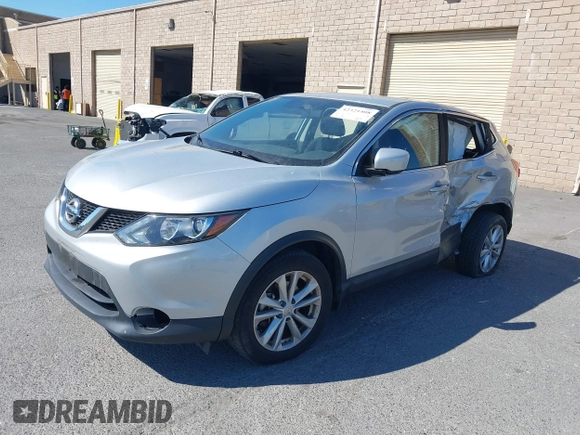 2017 Nissan Rogue SV with VIN JN1BJ1CP7HW017295, listed as a IAAI auction lot 42321408 with 84,430 mi miles and . Bid and sale history available at DreamBid. Image 17.
