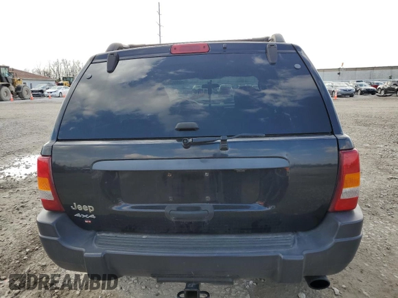 2004 Jeep Grand Cherokee Laredo with VIN 1J4GW48S84C184757, listed as a Copart auction lot 52895745 with 242,307 mi miles and Salvage Title. Bid and sale history available at carsss.com. Image 6.