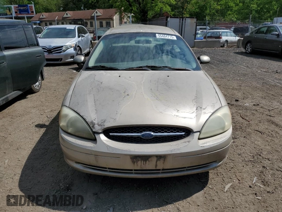 2001 Ford Taurus SE with VIN 1FAFP53U91G108049, listed as a Copart auction lot 55464715 with 85,748 mi miles and Salvage title. Bid and sale history available at DreamBid. Image 5.