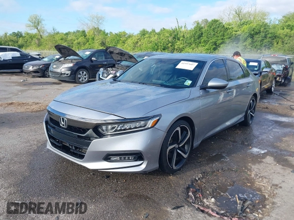 2019 Honda Accord Sport with VIN 1HGCV1F3XKA043815, listed as a IAAI auction lot 41997607 with 91,001 mi miles and . Bid and sale history available at DreamBid. Image 2.