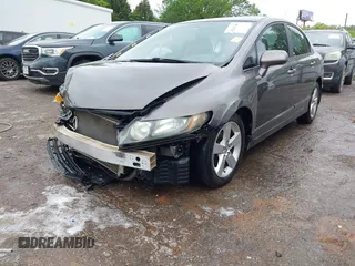 2010 Honda Civic LX-S z VIN 19XFA1F60AE070633, wystawiony jako IAAI lot #42205266 z przebiegiem 217 467 mil mil oraz . Historia ofert i sprzedaży dostępna na DreamBid. Obrazek 18.