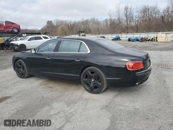 2014 Bentley Flying Spur with VIN SCBEC9ZA7EC095064, listed as a Copart auction lot 49405135 with 24,143 mi miles and Salvage Title. Bid and sale history available at DreamBid. Image 2.